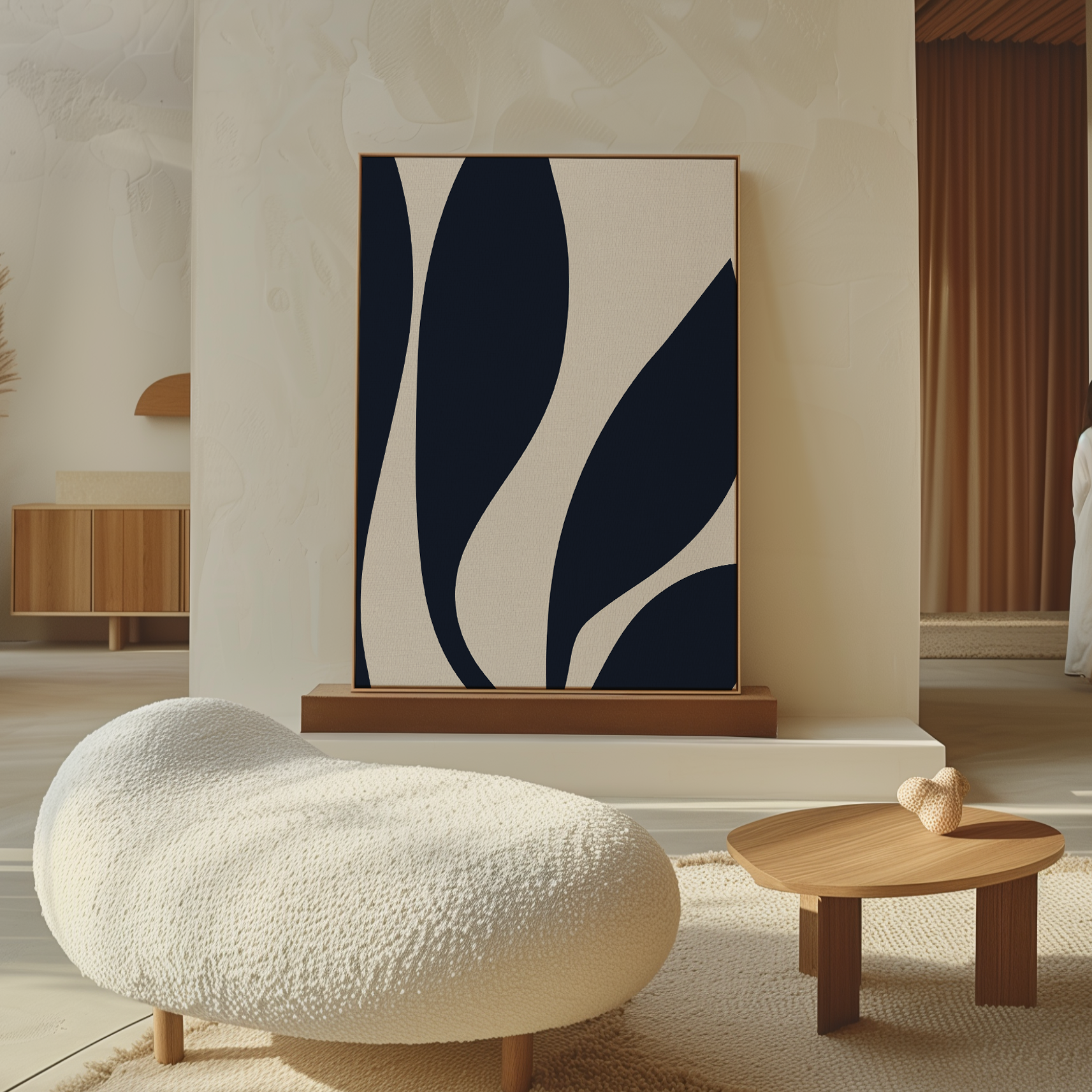 A modern living room features a textured white lounge chair, wooden coffee table, and the Dark Blue Leaves Abstract Canvas Art on a beige sculpted wall. Warm lighting enhances the cozy space and highlights its modern elegance.