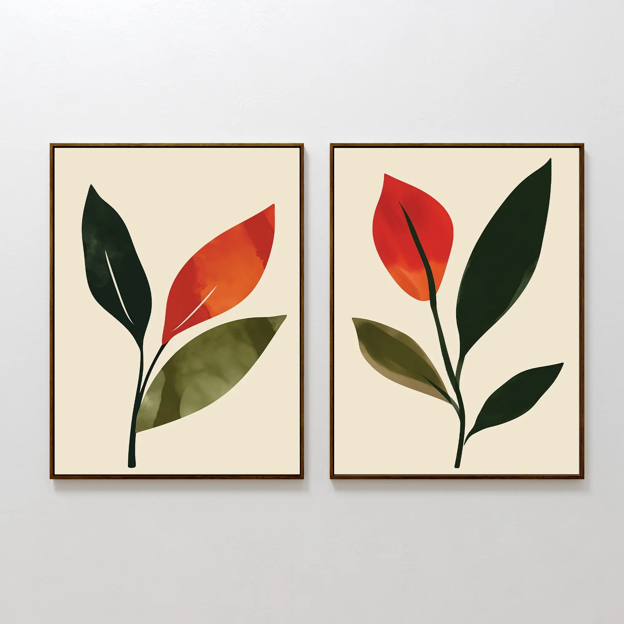 The Rustic Stems Set of 2 features minimalist framed prints with abstract green and orange leaves on a light beige background. Each print displays a single stem with overlapping leaves, ideal for modern living room decor.