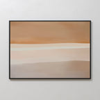 Saharan Lines Abstract Canvas Art features horizontal bands in warm earthy tones—beige, tan, and light brown—framed in black and displayed on a light-textured wall, making it perfect large wall art for minimalist spaces.