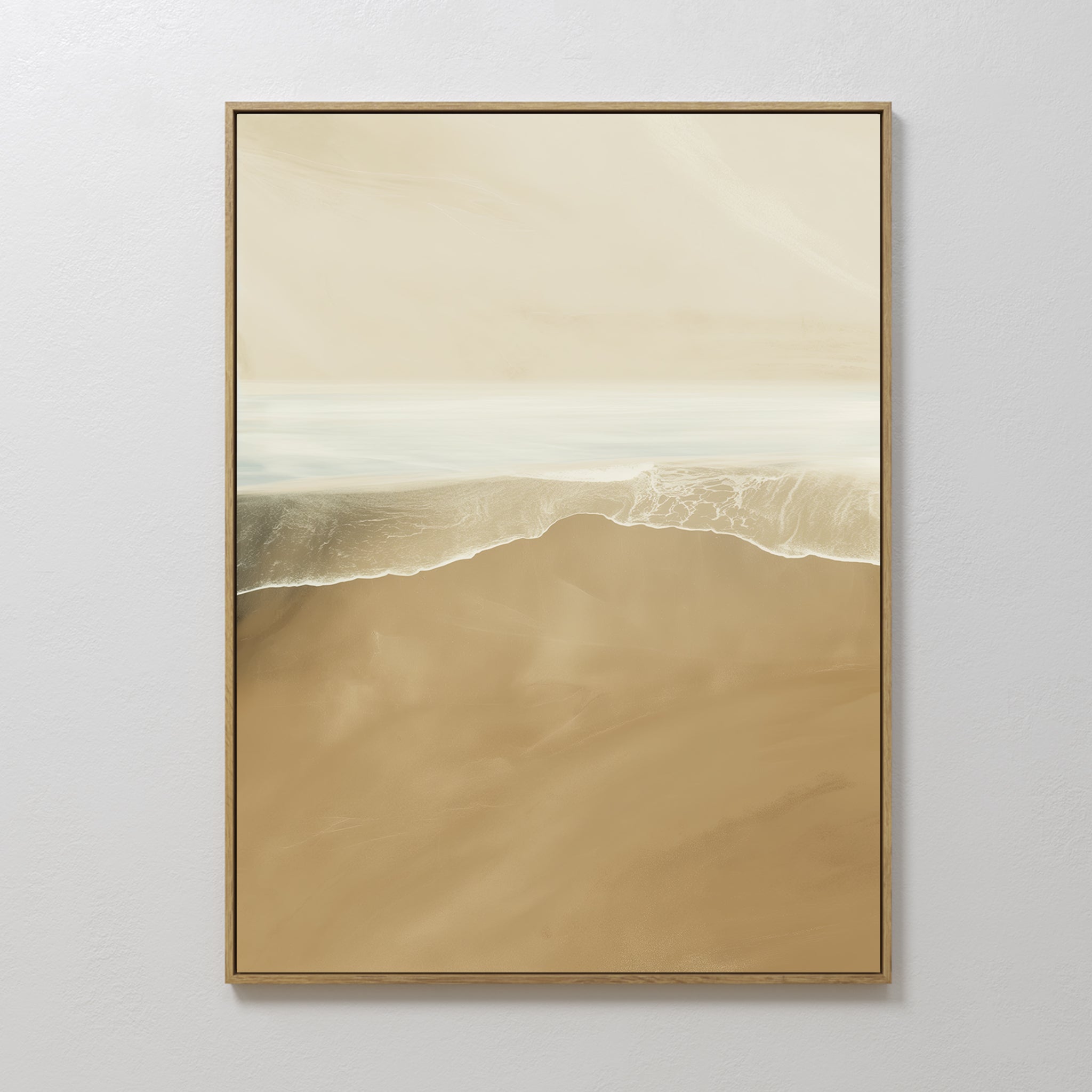 Sand and Sea Abstract Canvas Art—a framed painting of gentle waves on a sandy shore in soft beige, tan, and white tones—makes the perfect minimalist wall art for any neutral home decor.