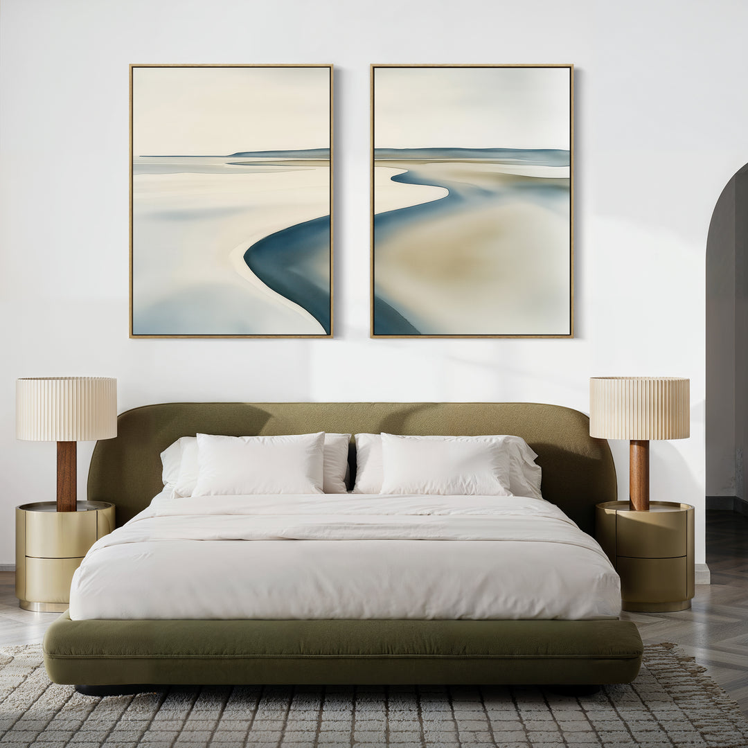 A bed with the Serene Coastline Set of 2 lamps and minimalist wall art above, creating a serene and stylish space.