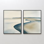The Serene Coastline Set of 2 features framed abstract paintings of a shoreline in soft beige, blue, and gray tones. Their smooth, blurred lines offer minimalist, Nordic Park-inspired coastal wall art for modern spaces.