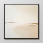 The Serene Expanse Abstract Canvas Art features minimalist wall art in neutral beige and cream tones with soft gradients, framed in black and displayed on a light wall—ideal modern decor for your living room.