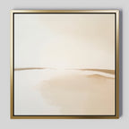 Serene Expanse Abstract Canvas Art features a soft beige and white abstract landscape in a gold frame—ideal modern wall art to bring serenity to your living room decor.
