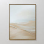 The Serene Peaks Abstract Canvas Art showcases soft, beige sand dunes beneath a pale, cloudy sky in a simple wooden frame. Its smooth lines and calming neutral colors make it perfect wall art for a tranquil space.