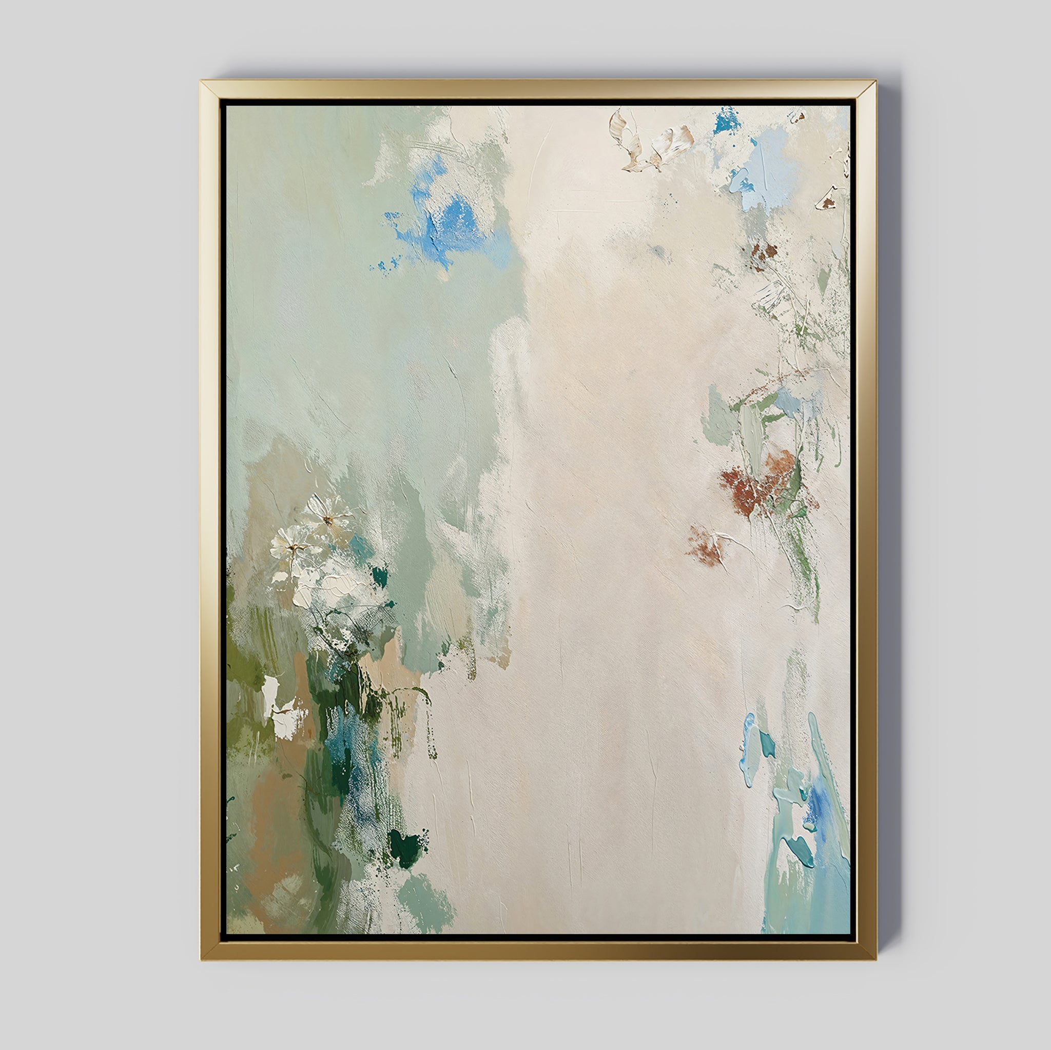 Serenity Garden Abstract Canvas Art features soft, blended pastel shades of green, blue, beige, and white with brown and gold accents. Framed in a thin gold frame, this modern piece is perfect for contemporary décor.