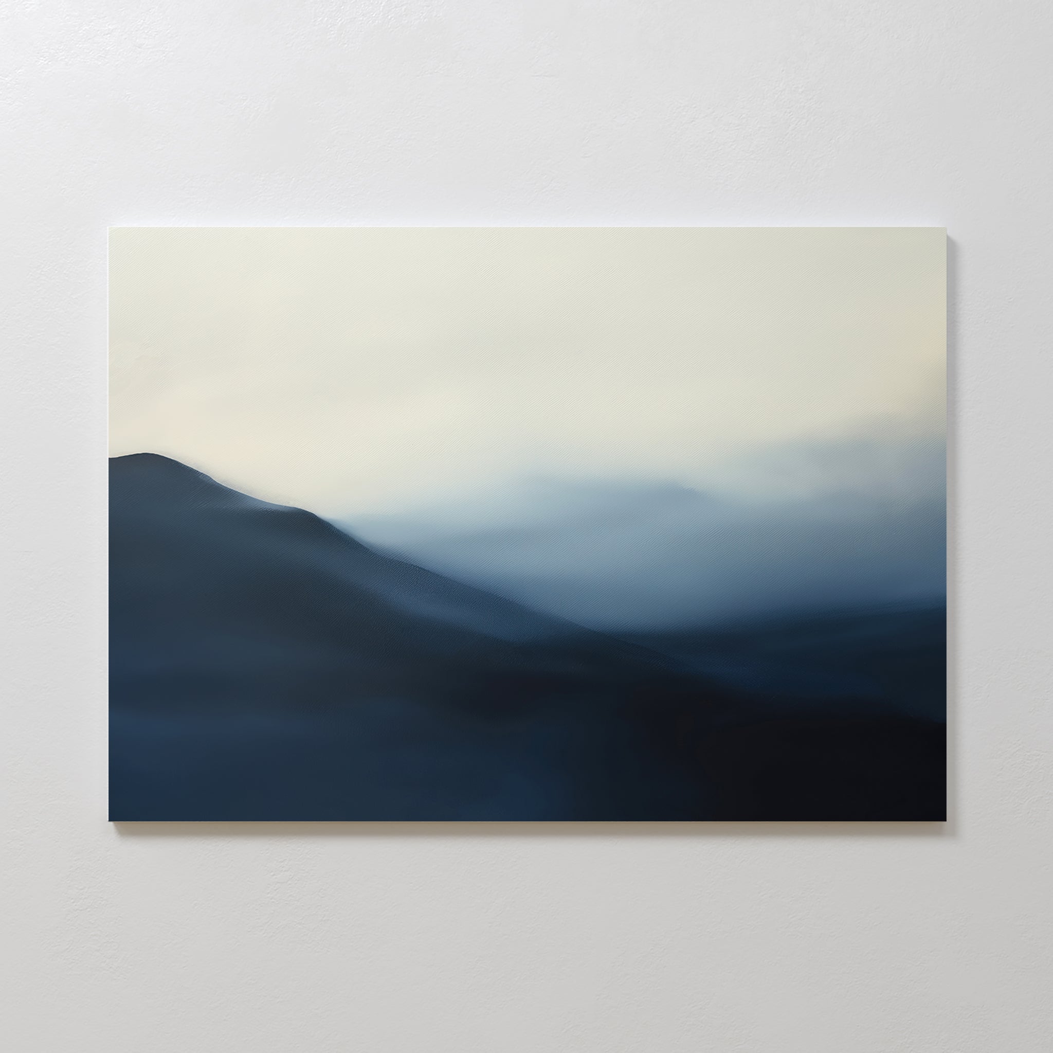 Shadowed Valley Canvas Art – Horizontal displays blurred blue and gray landscapes evoking misty mountains beneath a pale sky, making it the perfect calming decor for any bedroom wall.