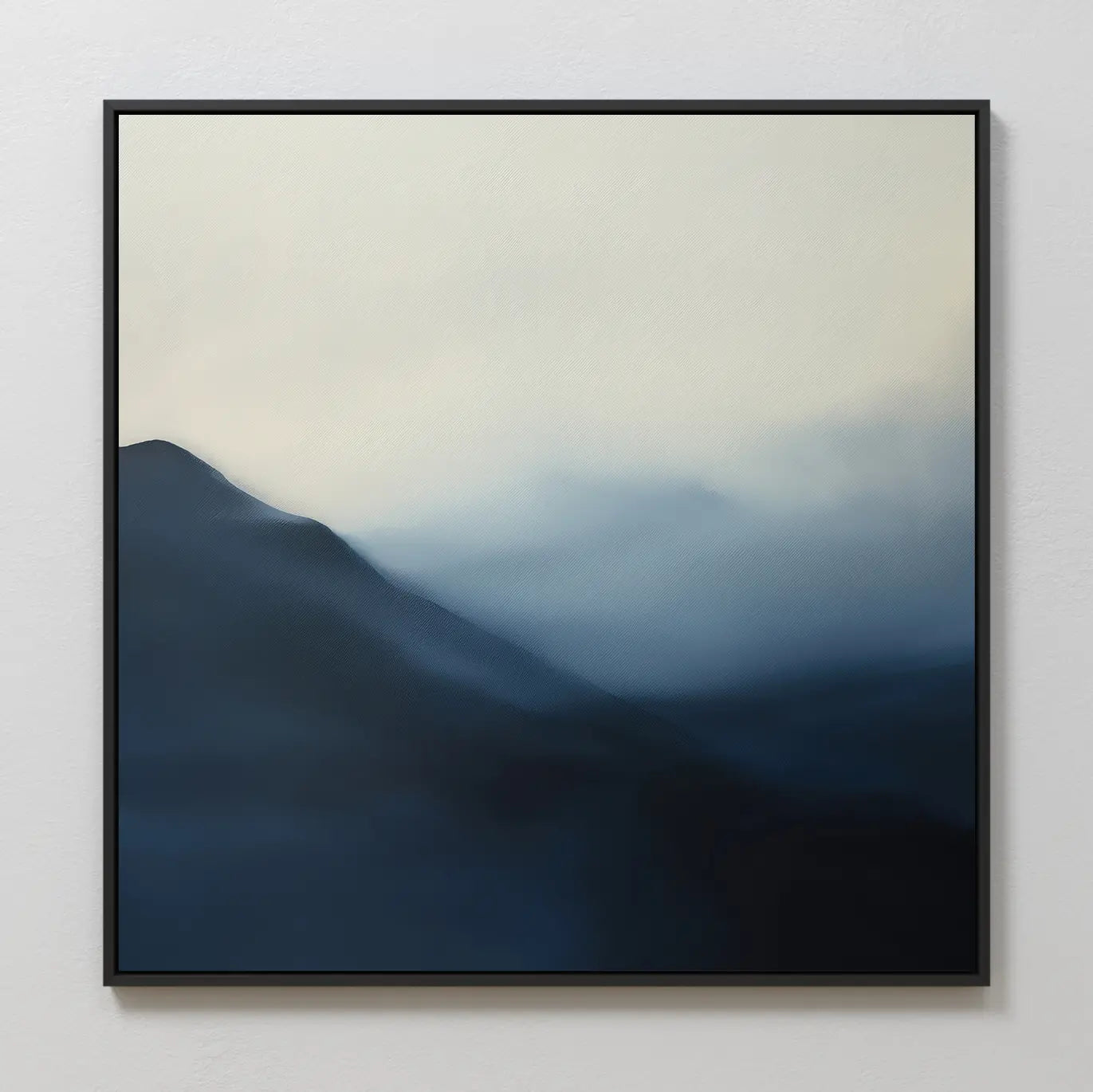 The Shadowed Valley Canvas Art, featuring misty mountains in blue and gray tones with soft, blurred gradients, creates a calming abstract landscape—perfect minimalist wall decor for a serene space.