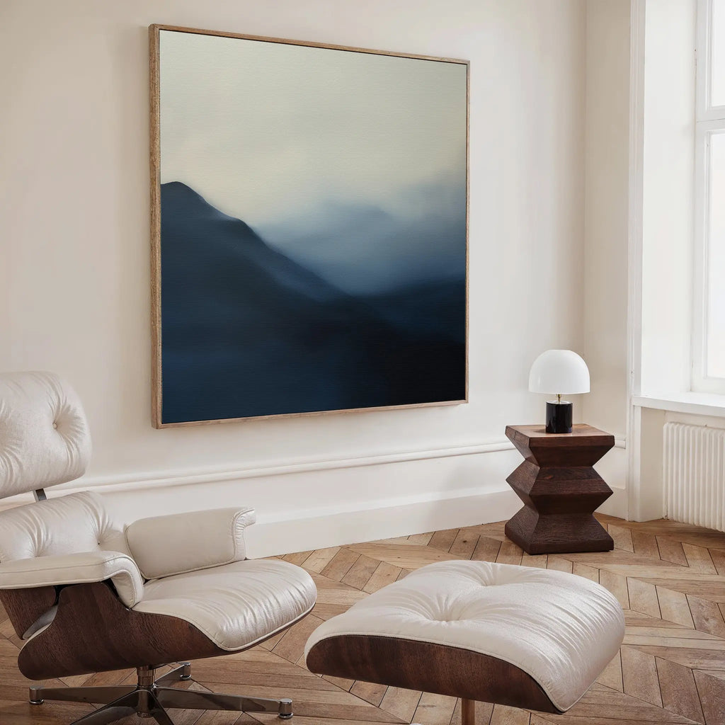 A room with calming decor features the Shadowed Valley Canvas Art, an abstract piece hanging on the wall.