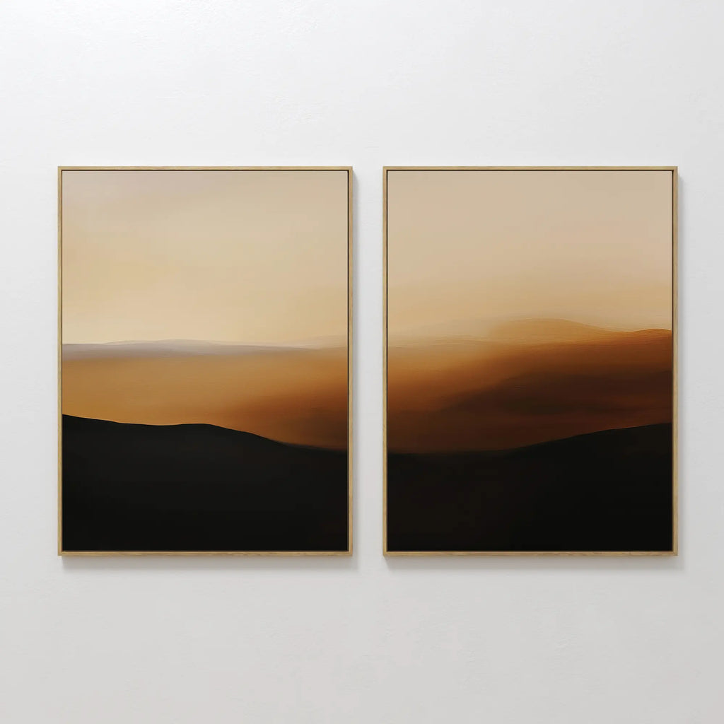 The Sienna Echo Set of 2 features framed abstract paintings with soft brown, tan, and black gradients, resembling misty hills—ideal minimalist landscape wall art to enhance your living room decor.