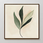 Silent Leaf Canvas Art features a minimalist green leafy branch with four elongated leaves on a soft beige background, elegantly framed in dark wood—ideal botanical wall art for Nordic décor.