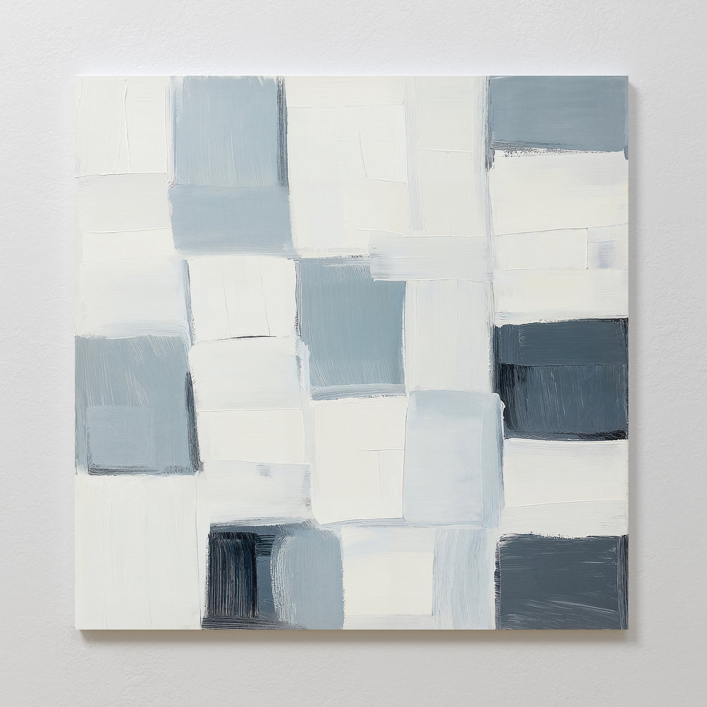 Silent Squares Abstract Canvas Art showcases overlapping white, gray, and blue rectangles with soft edges and visible brushstrokes—perfect minimalist wall decor for modern homes, shown mounted on a light-colored wall.