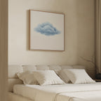 A beige bedroom features a tufted bed with white bedding and the Single Cloud Canvas Art above the headboard. A bare branch in a vase decorates the bedside table, enhancing the modern decor and minimalist wall art vibe.