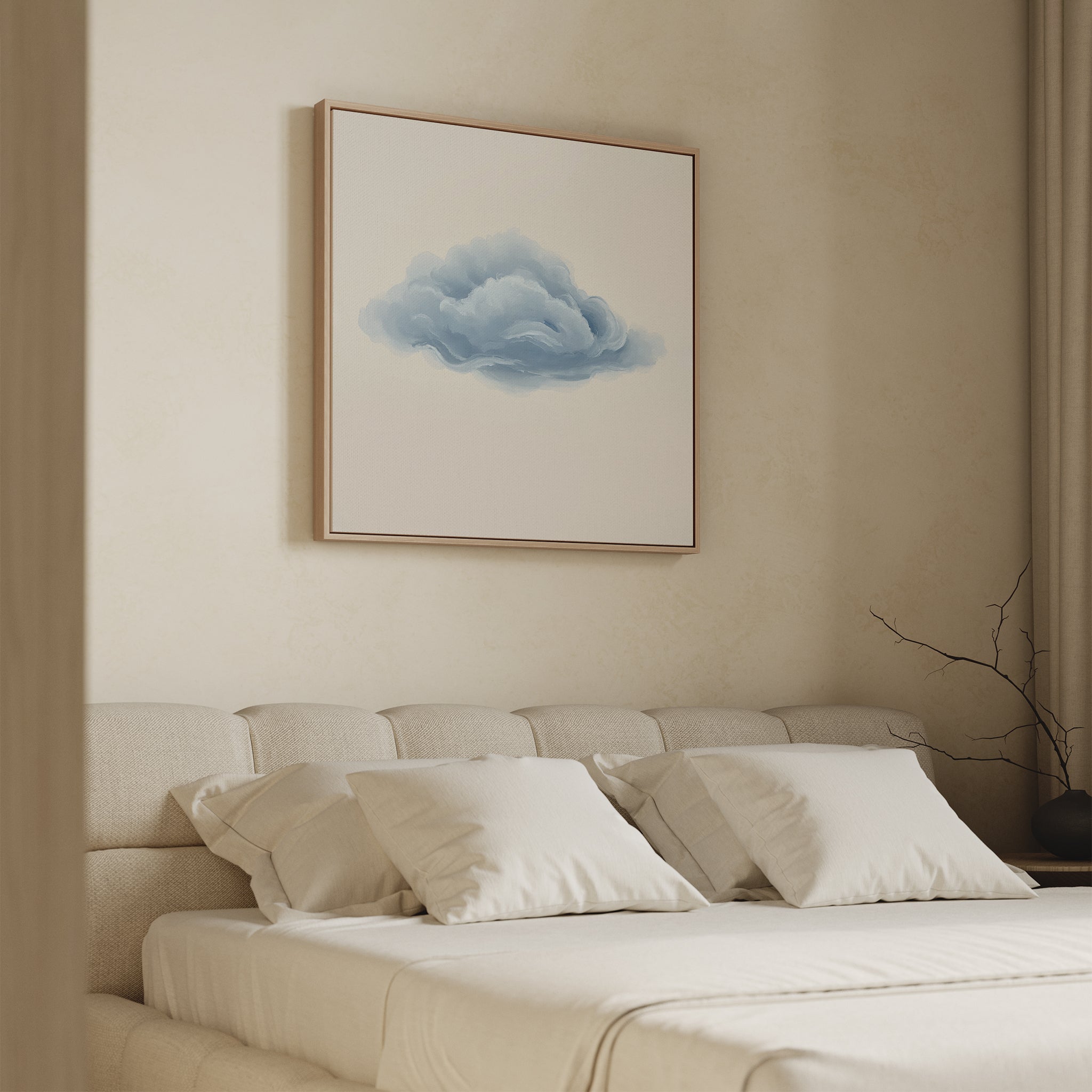 A beige bedroom features a tufted bed with white bedding and the Single Cloud Canvas Art above the headboard. A bare branch in a vase decorates the bedside table, enhancing the modern decor and minimalist wall art vibe.