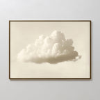 The Singular Vapor Canvas Art – Horizontal features a single fluffy white cloud on a pale background, ideal minimalist wall art for modern interiors or serene bedrooms, shown mounted on a plain white wall.