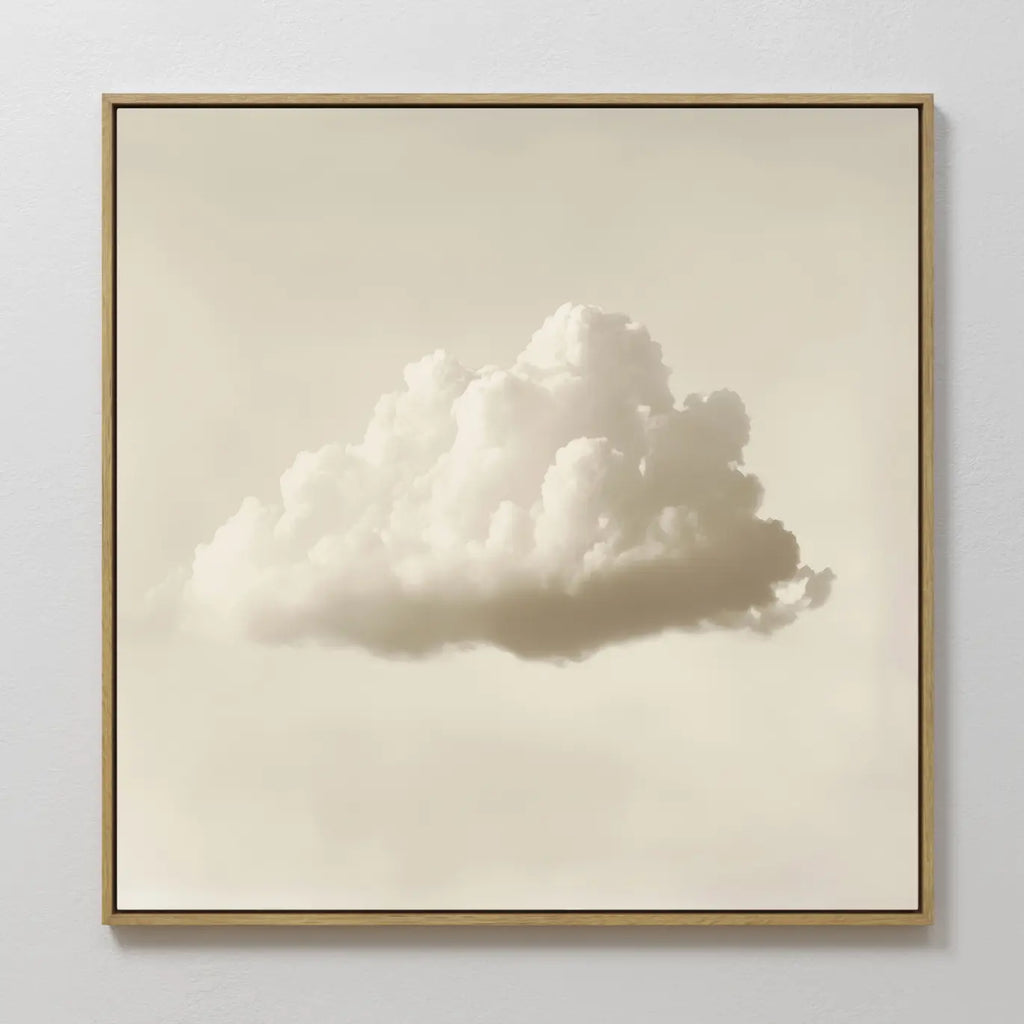 Singular Vapor Canvas Art: a minimalist framed wall piece showcasing a single fluffy white cloud on a soft beige background—perfect for bringing calm to modern interiors or as soothing bedroom decor.