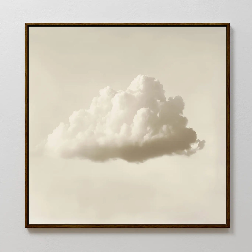The Singular Vapor Canvas Art displays a single fluffy white cloud centered on a pale, clear background. This minimalist framed piece adds a soft, serene touch to modern interiors, perfect for elevating any wall with simple elegance.