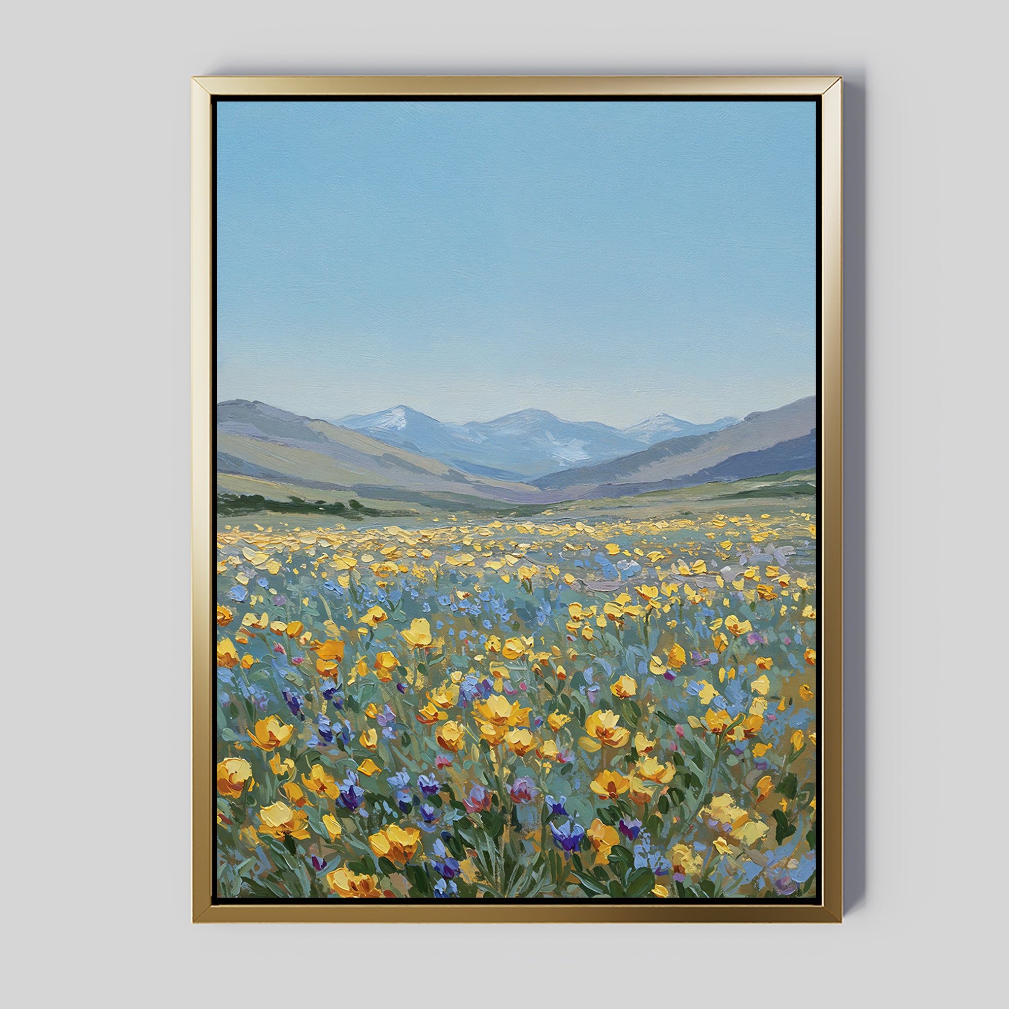 Skyview Field Canvas Art features a vibrant wildflower field with rolling green hills and snow-capped mountains under a clear blue sky—ideal large wall art to add color and beauty to your bedroom decor.