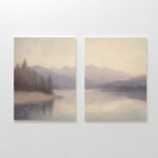 The Smoky Peaks Set of 2 features square canvas prints of a tranquil lake, misty forest, and distant mountains in soft blue, gray, and beige, creating a calm and serene atmosphere for your wall.