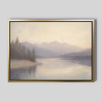Smoky Peaks Canvas Art features a serene lake with calm water, misty pine trees, and distant peaks under a hazy sky. With its muted, soothing palette, this framed print is perfect for vintage decor.