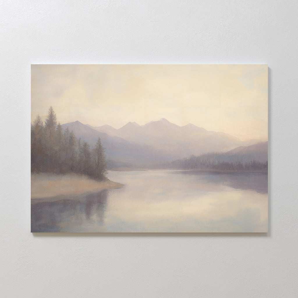 Smoky Peaks Canvas Art features a soft, pastel landscape of calm water reflecting distant mountains and trees under a hazy sky, adding a serene touch to any space—ideal for vintage decor or as an elegant print canvas.