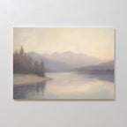 Smoky Peaks Canvas Art features a soft, pastel landscape of calm water reflecting distant mountains and trees under a hazy sky, adding a serene touch to any space—ideal for vintage decor or as an elegant print canvas.