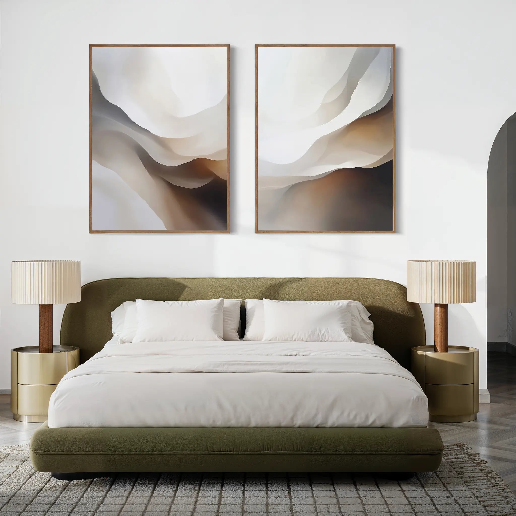 A modern bedroom with an olive green upholstered bed, white bedding, beige nightstands with the Smooth Flow Set of 2 table lamps, abstract wall art above the bed, and a textured area rug for a perfect touch of modern decor.