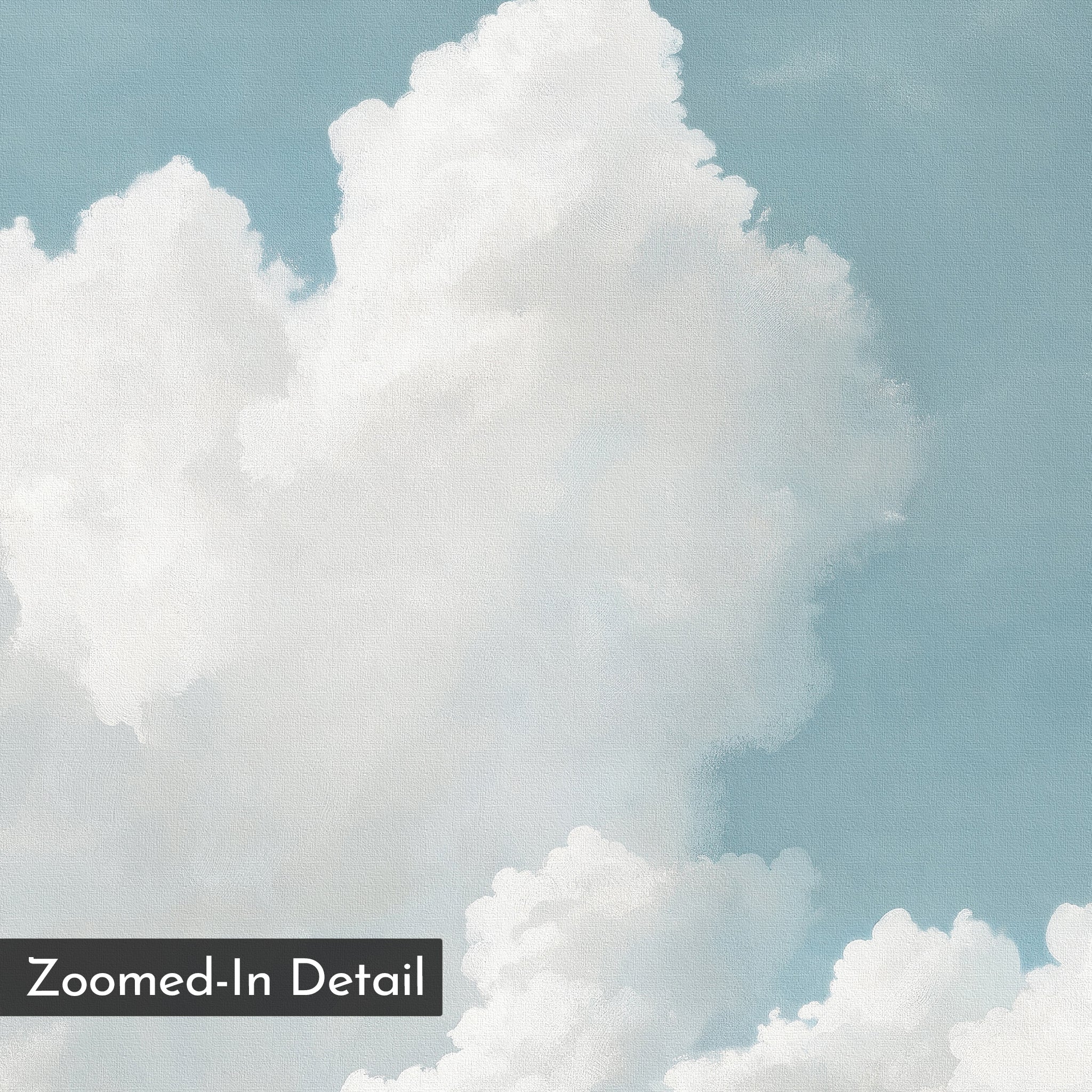 A close-up of fluffy white clouds against a light blue sky with a soft, painted texture. The Soaring Peace Set of 2 wall art prints brings tranquility to your space, featuring a discreet "Zoomed-In Detail" label in the bottom left corner.