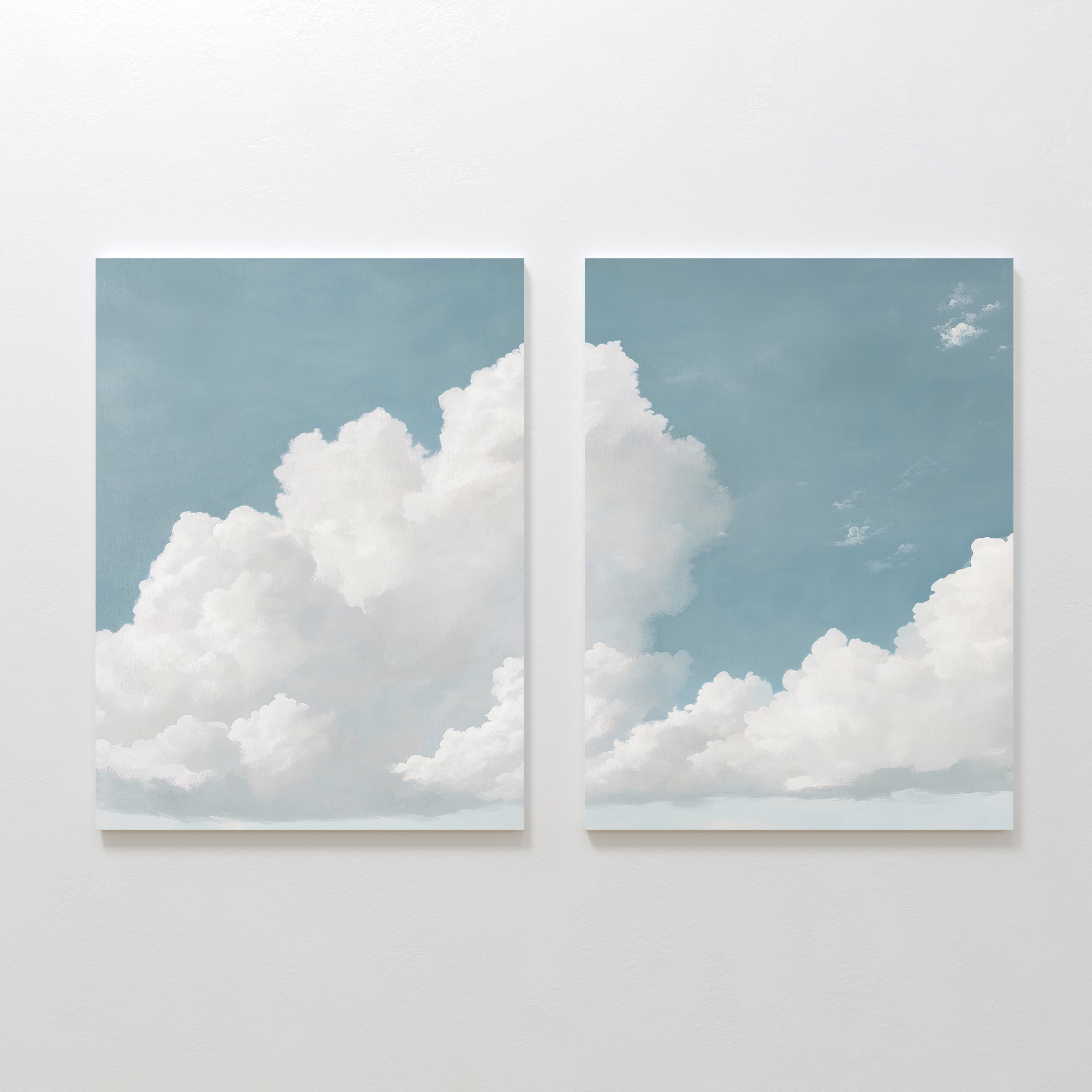 The Soaring Peace Set of 2 features wall art prints showing fluffy white clouds across a blue sky that flow seamlessly together, creating a calming focal point perfect for adding vintage charm to your space.