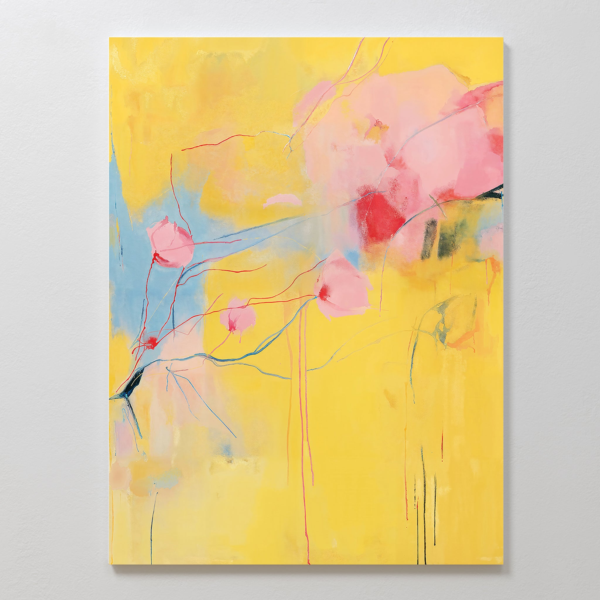Soft Bloom Abstract Canvas Art features a bright yellow background with soft pink and red shapes, black branch-like lines, and a splash of light blue—creating vibrant, airy wall art thats perfect for living room decor.