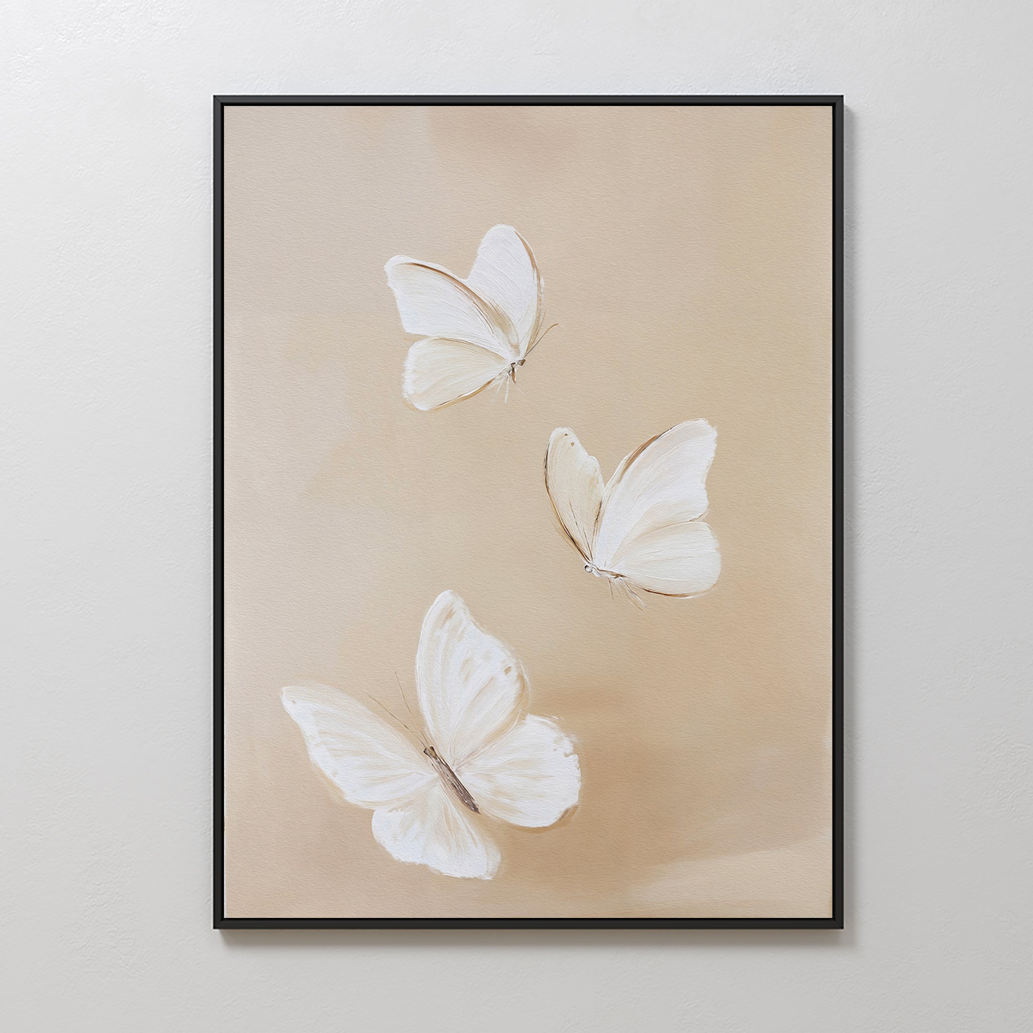 Linen Wings Canvas Art showcases three white butterflies with delicate wings on a soft beige backdrop—an elegant framed wall decor perfect for Nordic Park-inspired spaces.