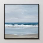 Soft Tide Canvas Art features a serene beach with gentle waves, light brown sand, and a cloudy blue-gray sky. This framed piece adds peaceful, minimalist coastal decor to your wall art collection.