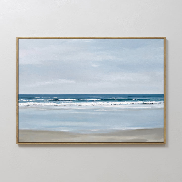 The Soft Tide Canvas Art – Horizontal features a calm beach scene with gentle waves and a light blue sky, making it the perfect minimalist wall art for adding tranquility to your bedroom or creating elegant coastal displays.