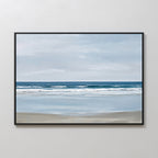 Soft Tide Canvas Art – Horizontal showcases a calm beach with gentle waves, sandy shore, and cloudy sky in soft blue, white, and beige tones—perfect minimalist wall art for serene bedroom decor.