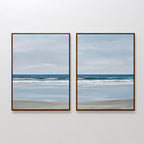 The Soft Tide Set of 2 features framed seascape paintings in soft blues and grays, ideal minimalist wall art to bring serene coastal vibes and enhance your bedroom decor.