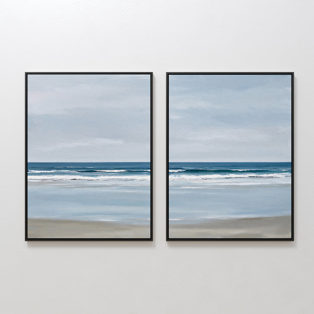 The Soft Tide Set of 2 features framed paintings of calm beaches with gentle waves and cloudy skies—perfect coastal wall art for a serene bedroom or minimalist decor, creating a tranquil, continuous ocean view.