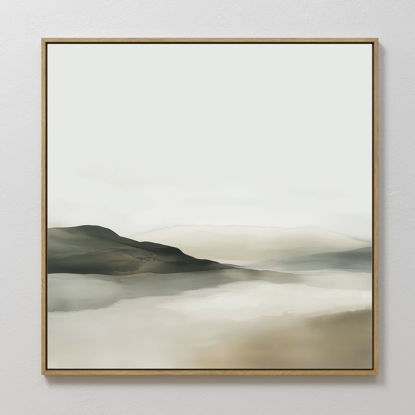 Soft Valley Canvas Art features gentle hills in muted gray, beige, and green reflected in calm water under a pale sky. Framed in a simple wooden frame, its perfect for minimalist or bedroom decor.