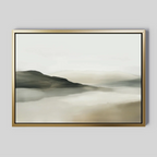 The Soft Valley Canvas Art – Horizontal features abstract hills and calm water in muted beige, gray, and white tones, set in a gold frame against a light gray background—ideal for peaceful minimalist decor.