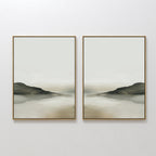 The Soft Valley Set of 2 features framed minimalist landscape art in beige, gray, and brown tones—ideal for calm, modern spaces with peaceful depictions of hills and a reflective surface beneath a pale sky.