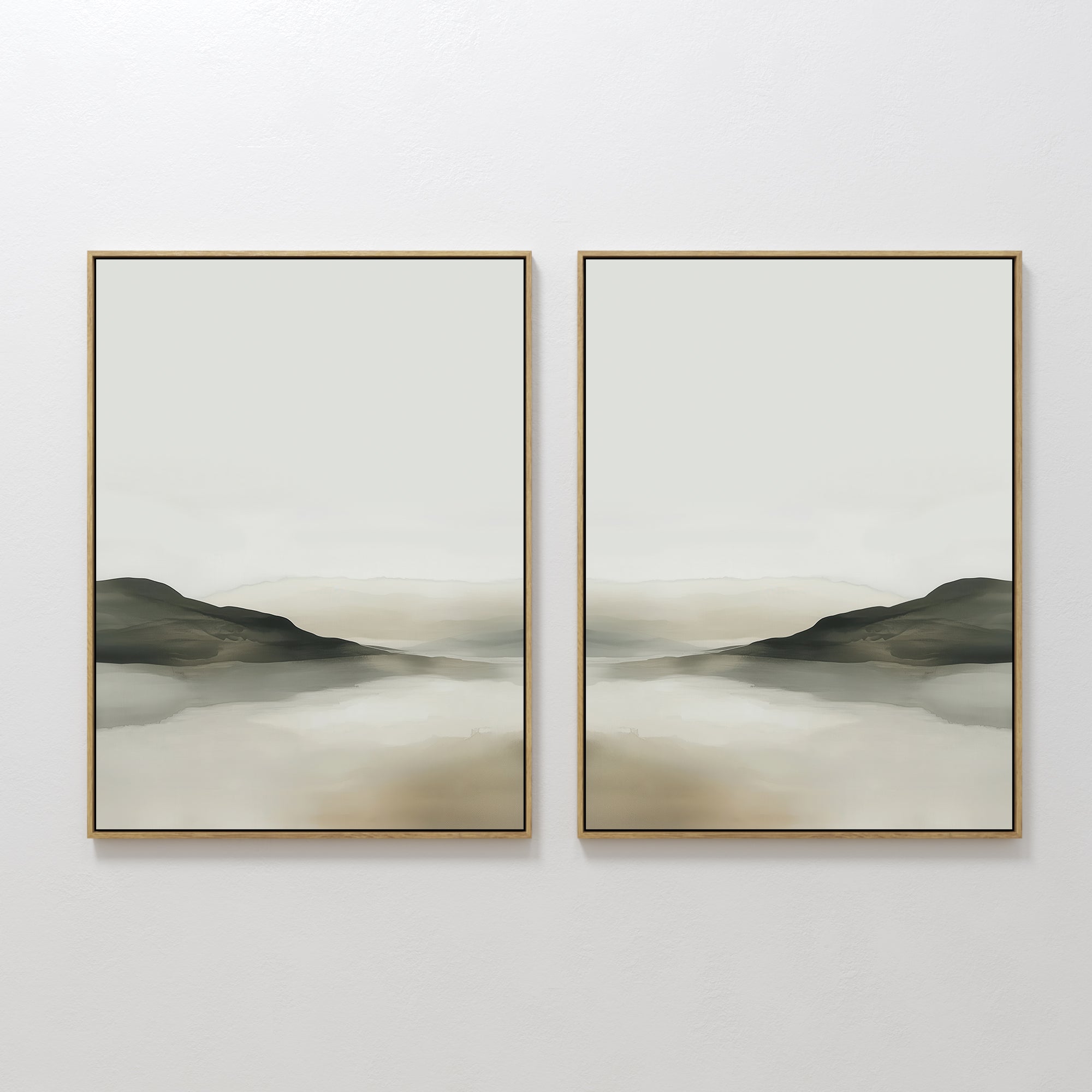 The Soft Valley Set of 2 features framed minimalist landscape art in beige, gray, and brown tones—ideal for calm, modern spaces with peaceful depictions of hills and a reflective surface beneath a pale sky.