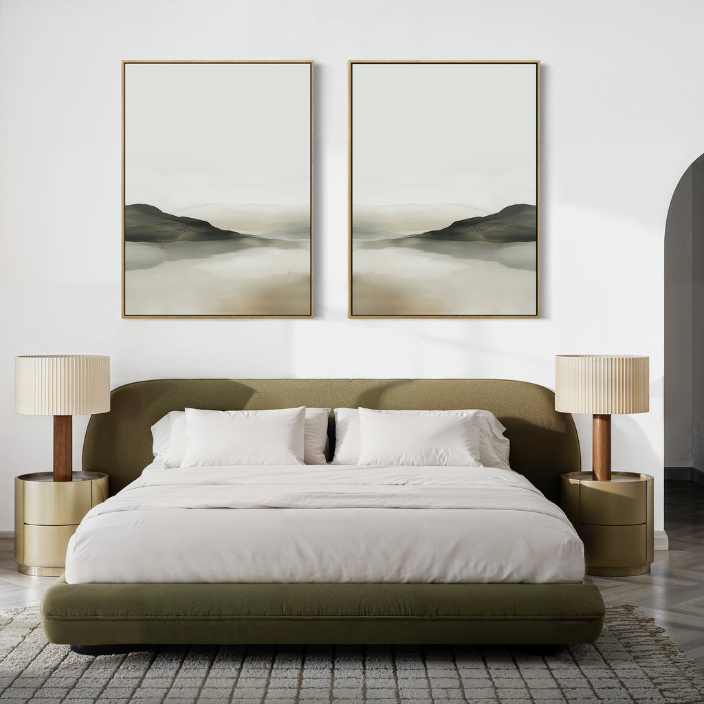 A modern bedroom with a low olive-green bed, white bedding, two beige nightstands with matching lamps, a textured rug, and the Soft Valley Set of 2 landscape wall art pieces displayed above the bed.