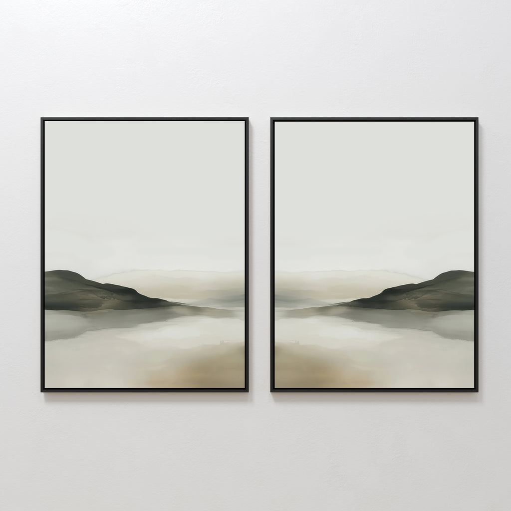 The Soft Valley Set of 2 features framed landscape wall art in muted earth tones, each showing misty hills and water with soft, blurred edges—ideal for bringing a peaceful touch to minimalist spaces.