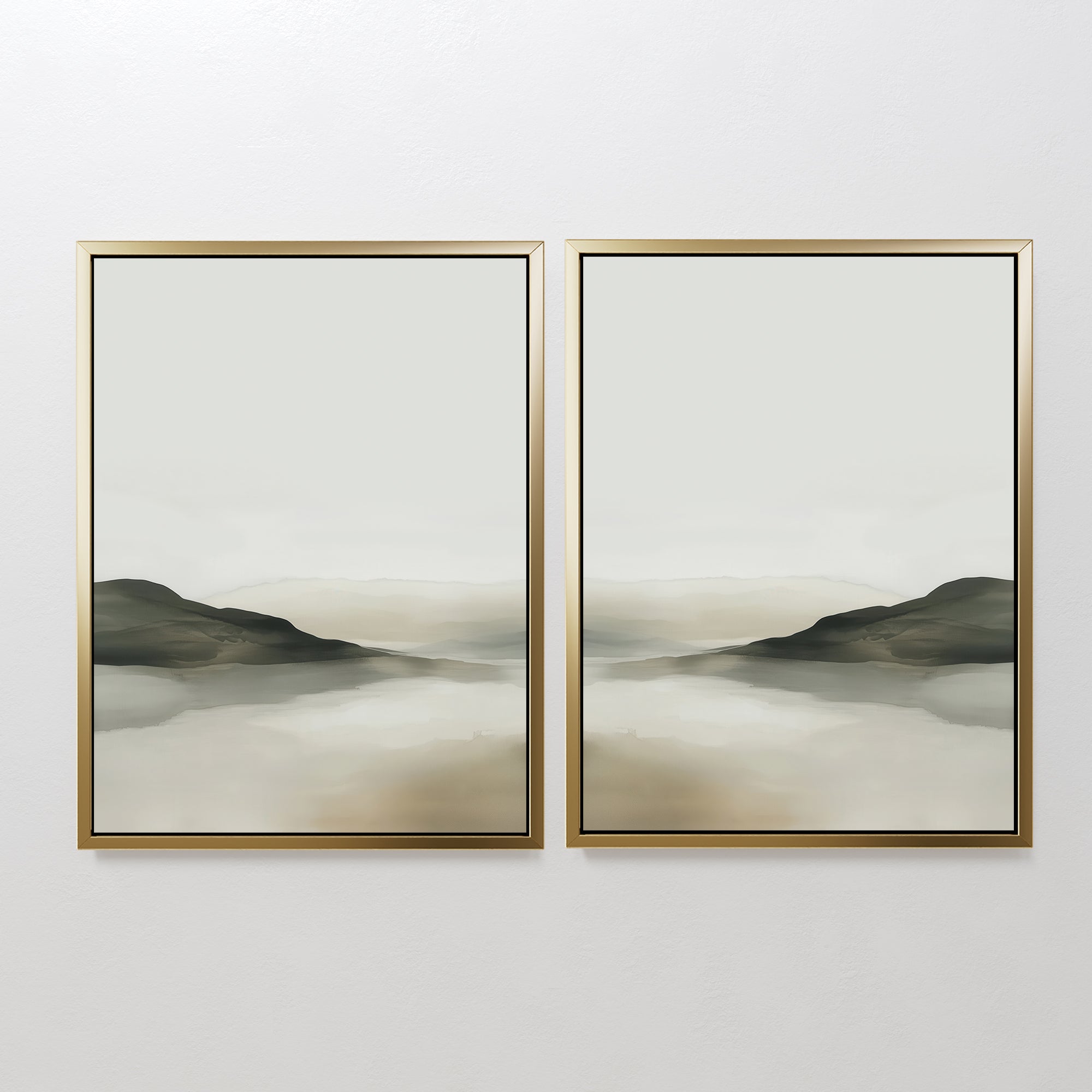 The Soft Valley Set of 2 features landscape wall art in gold frames, each showcasing gentle hills, misty neutral backgrounds, and water reflections—ideal for fans of peaceful, minimalist decor.