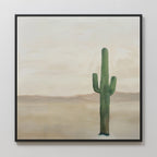 Solitary Rise Canvas Art features a single tall green cactus in a vast desert with distant brown hills under a pale cloudy sky—an ideal minimalist wall art print for living room decor.