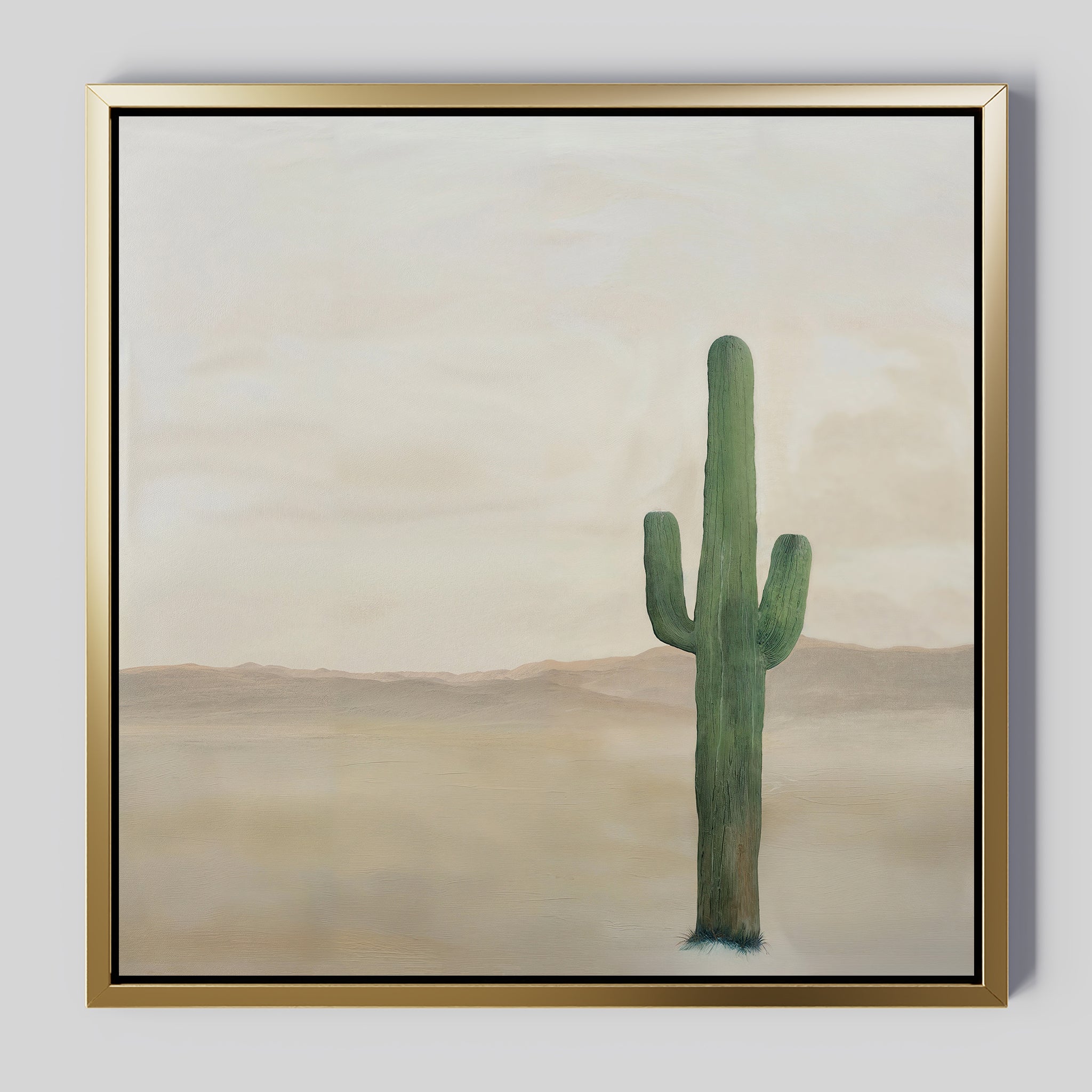 Solitary Rise Canvas Art features a green cactus standing alone in a sandy desert with distant hills and a pale, cloudy sky—an ideal minimalist wall art piece for any living room décor.