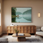 A cozy living room with neutral tones, a wooden coffee table, sideboard, and the Solitude by the Lake Canvas Art featuring a deer by reflective water and pine trees. A vase with flowers sits on the table, adding a serene touch.