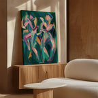 The Spiralling Forms Abstract Canvas Art, featuring colorful, dynamic brushstrokes, leans against a wooden cabinet in a sunlit modern room with beige walls, a textured white sofa, and a round white table.