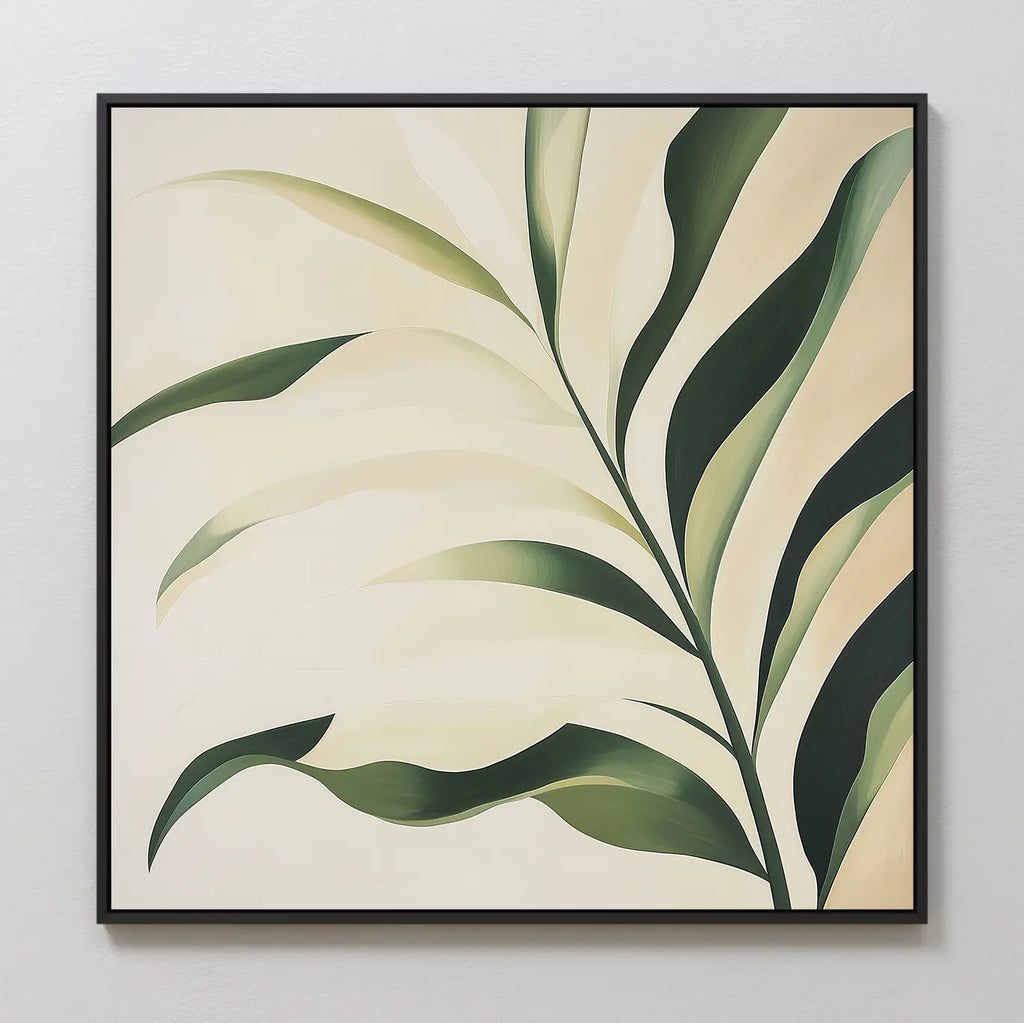 The Spring Foliage Canvas Art features a minimalist leafy plant with long green leaves on a light beige background, framed in thin black and ideal for modern interiors or display on a plain white wall.