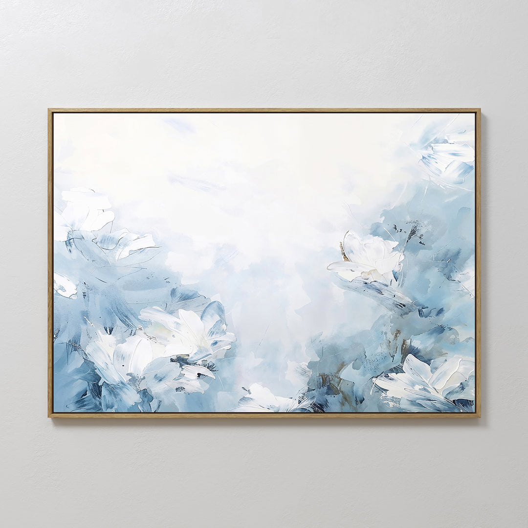 Spring Hues Canvas Art – Horizontal features a framed abstract design in soft blue and white, depicting dreamy flowers on a light background, adding a calming, modern touch to your living room decor.