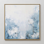 The Spring Hues Abstract Canvas Art showcases soft blue and white flowers with gentle brushstrokes, blending the floral design into a light background for a calm and tranquil atmosphere.